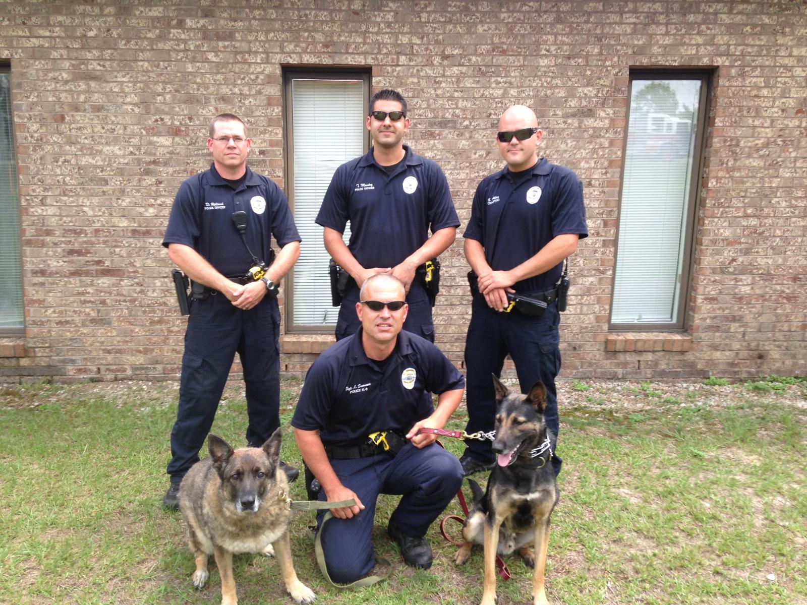 4 Police Officers with 2 K9 Officers